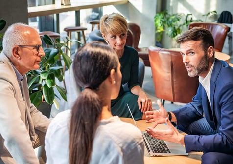 An advisor providing support to his business partners.