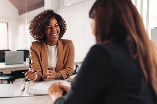 A woman visiting her financial consultant.