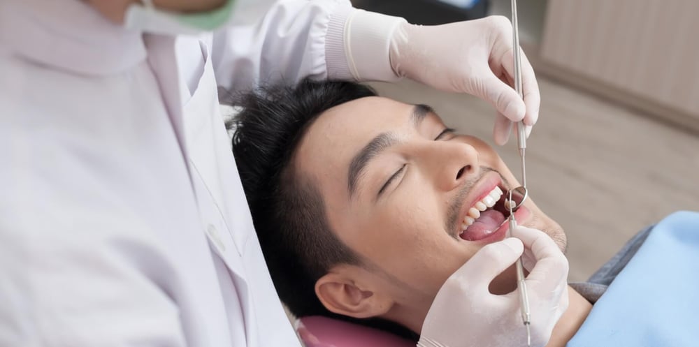 A man getting dental work done