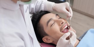 A man getting dental work done