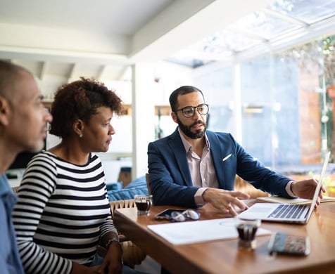 A couple receiving financial consultation