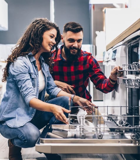 A couple shopping for a dish washer