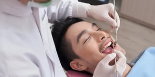 A man getting dental work done.