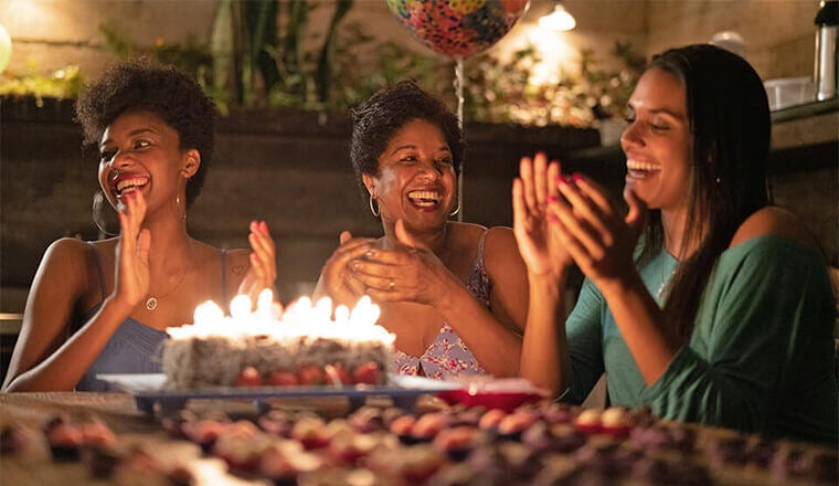 Women celebrate a friends birthday party